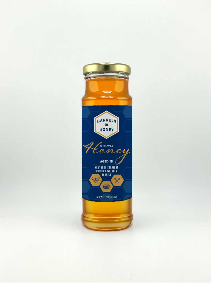 Barrels and Honey bourbon barrel aged raw honey 12 oz bottle with navy label and gold cap