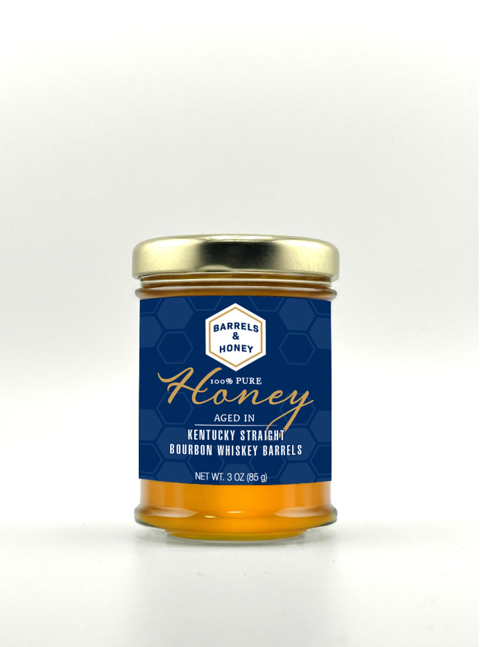 Barrels and Honey 3 oz bourbon barrel aged raw honey jar with navy label and gold cap